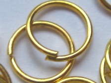 Кольцо для бус 6мм золотистое