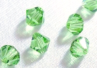 Бусина Swarovski арт.5301 биконус, размер 4 мм, цвет Peridot